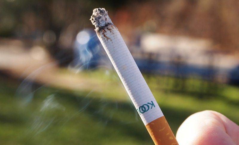 Cigarette and stained teeth